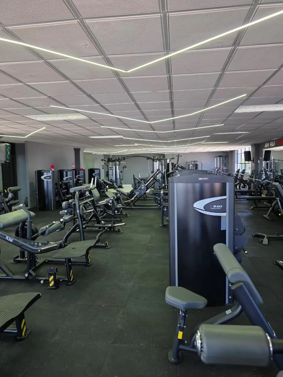 Gym strength zone on black rubber tile